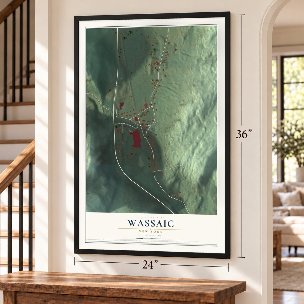 Wassaic, New York map, 24 x 36 inch print in a black frame by a staircase