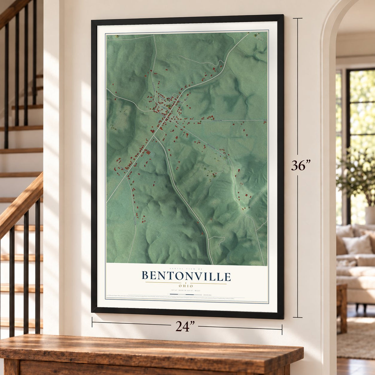 Bentonville, Ohio map, 24 x 36 inch print in a black frame by a staircase
