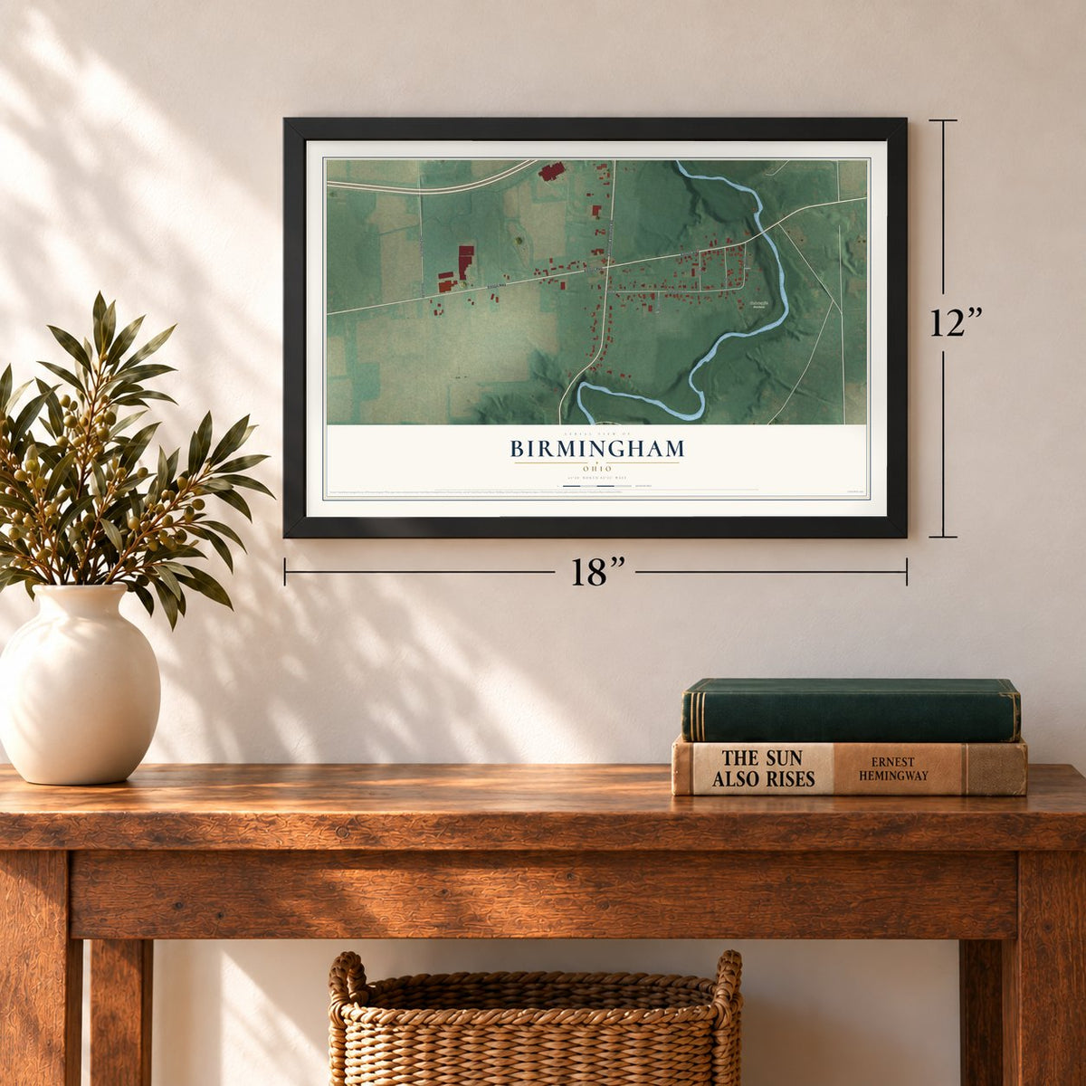 Birmingham, Ohio map, 12 x 18 inch print in a black frame in an entryway