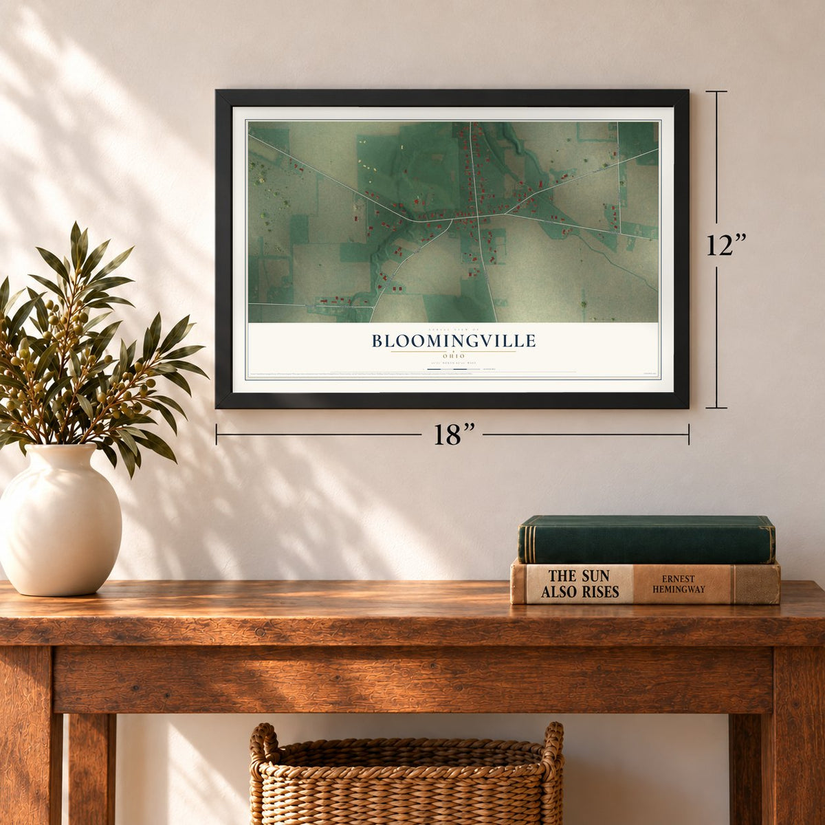 Bloomingville, Ohio map, 12 x 18 inch print in a black frame in an entryway