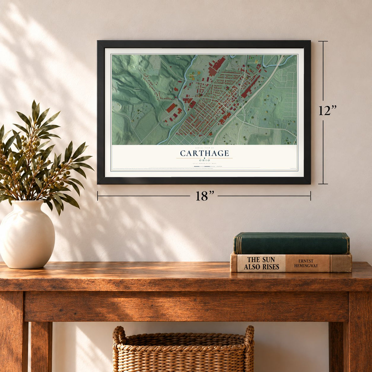 Carthage, Ohio map, 12 x 18 inch print in a black frame in an entryway