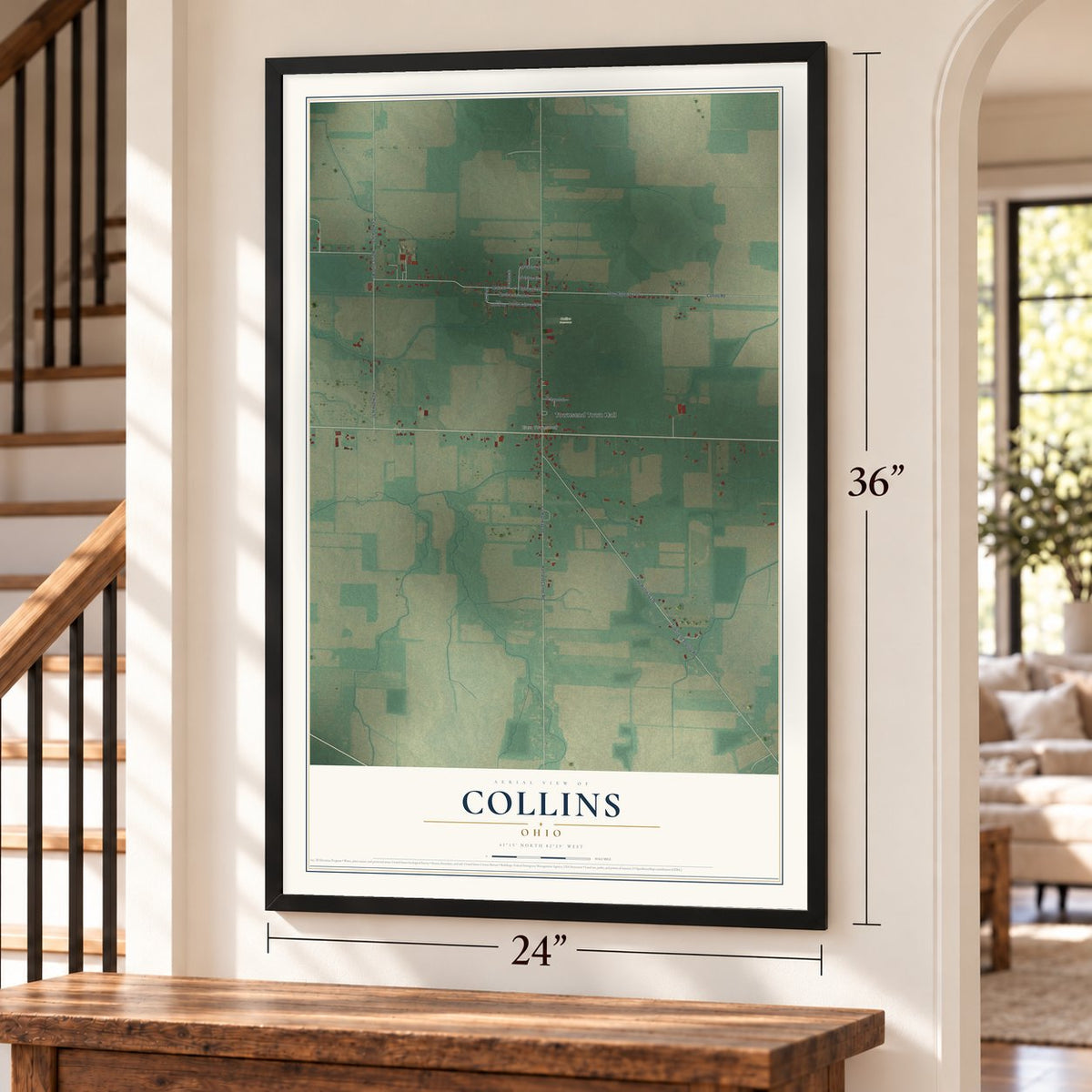 Collins, Ohio map, 24 x 36 inch print in a black frame by a staircase