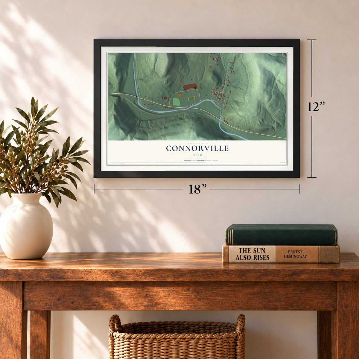 Connorville, Ohio map, 12 x 18 inch print in a black frame in an entryway