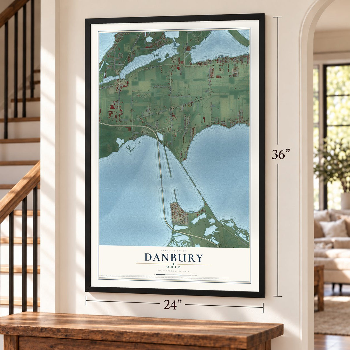Danbury, Ohio map, 24 x 36 inch print in a black frame by a staircase