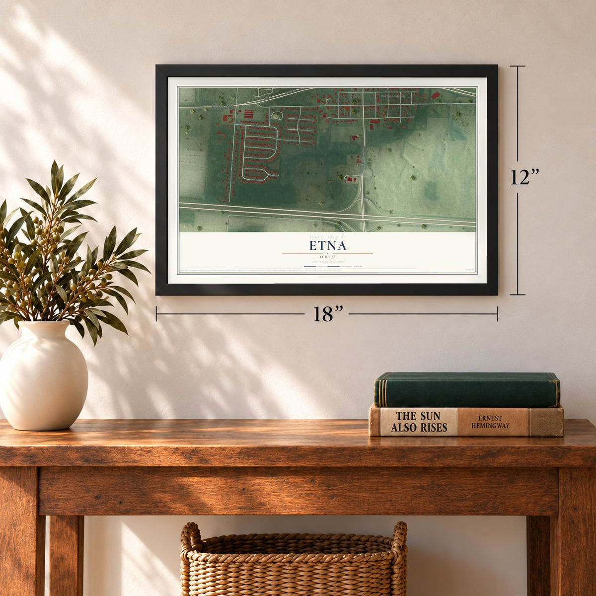 Etna, Ohio map, 12 x 18 inch print in a black frame in an entryway
