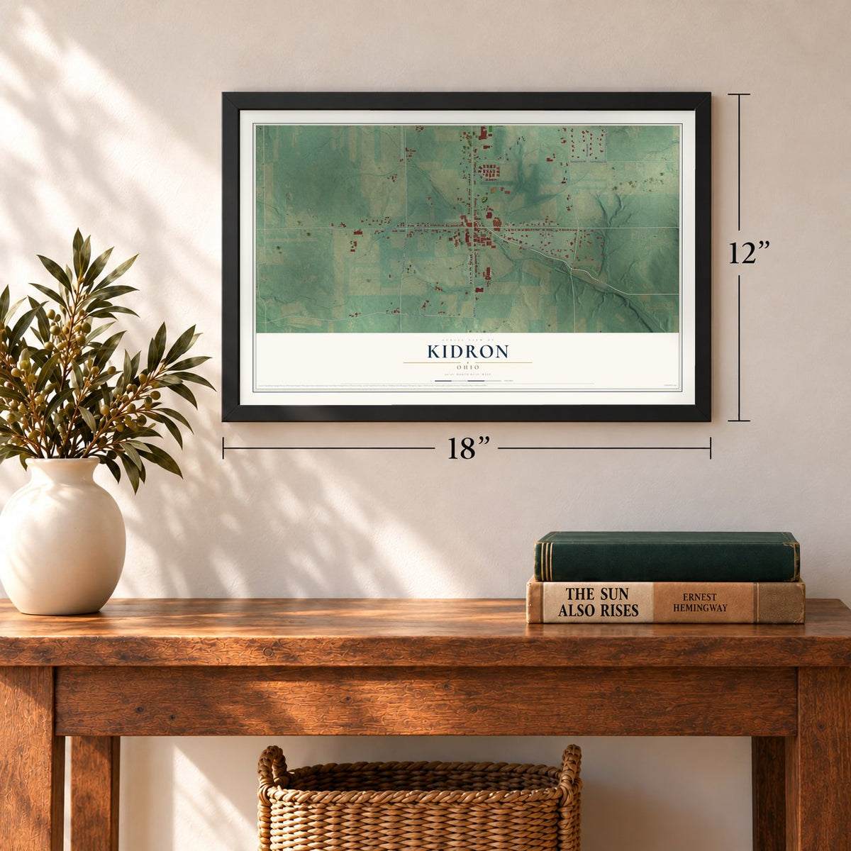 Kidron, Ohio map, 12 x 18 inch print in a black frame in an entryway