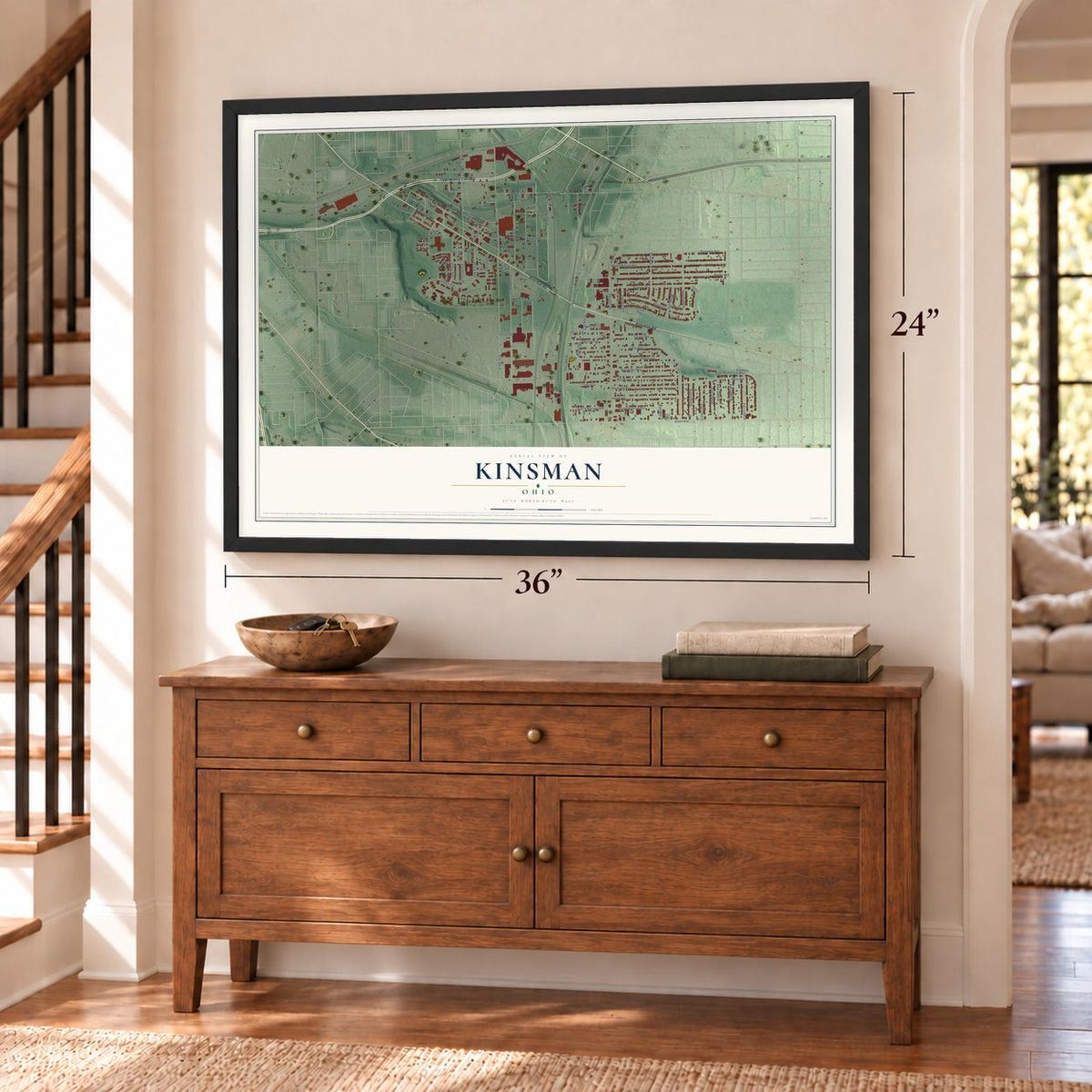 Kinsman, Ohio map, 24 x 36 inch print in a black frame above a dresser by a staircase