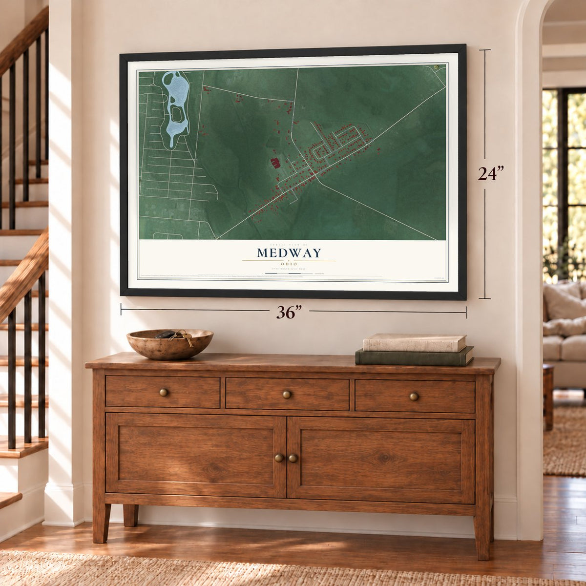 Medway, Ohio map, 24 x 36 inch print in a black frame above a dresser by a staircase