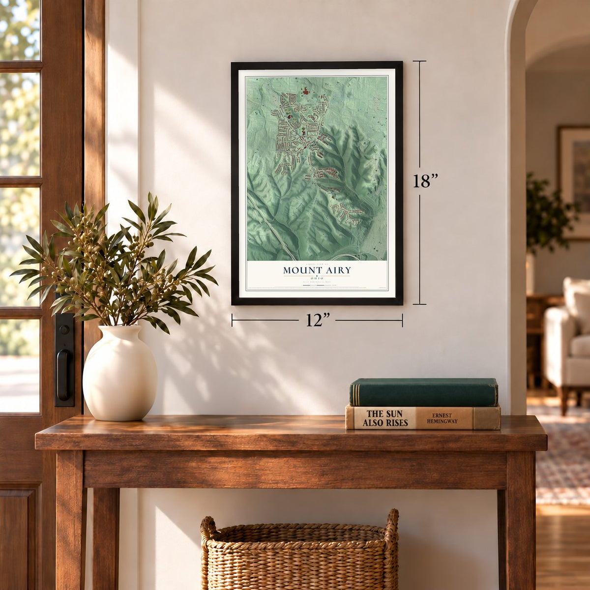 Mount Airy, Ohio map, 12 x 18 inch print in a black frame in an entryway