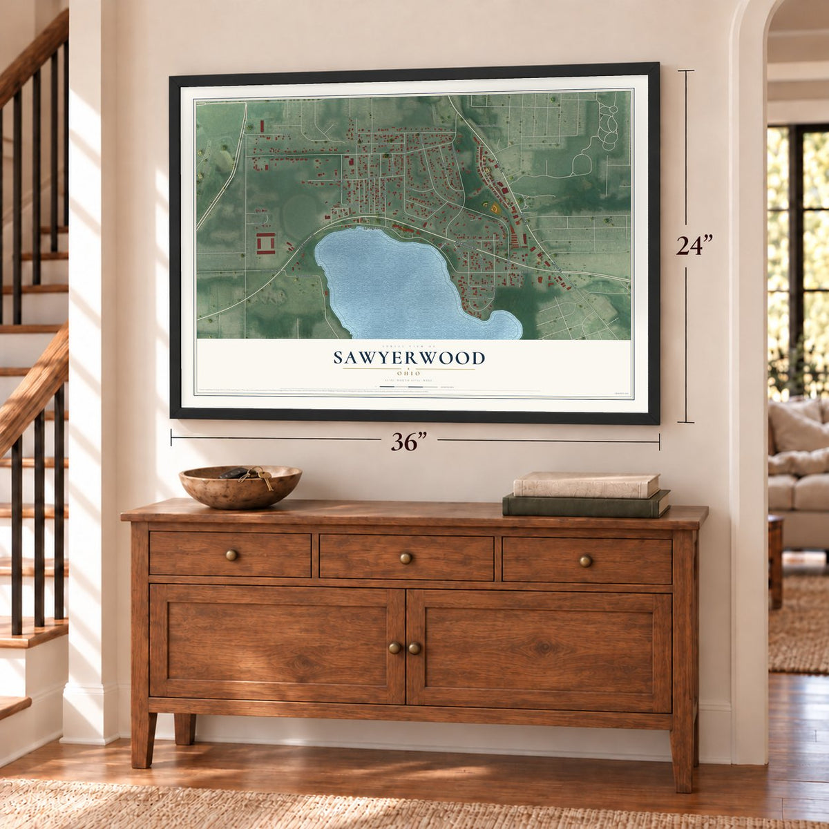 Sawyerwood, Ohio map, 24 x 36 inch print in a black frame above a dresser by a staircase