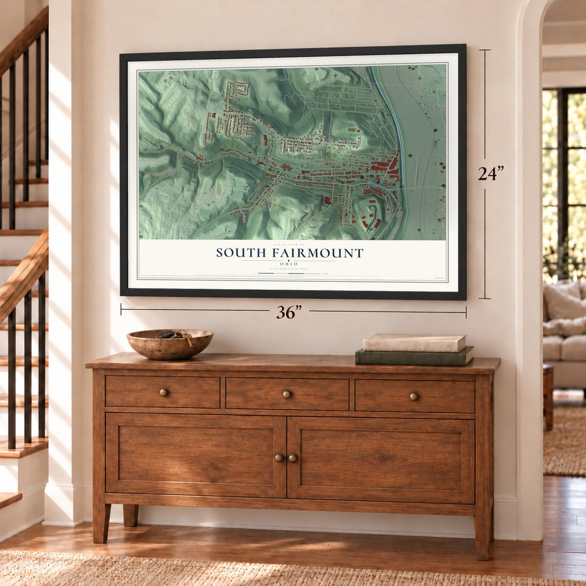South Fairmount, Ohio map, 24 x 36 inch print in a black frame above a dresser by a staircase