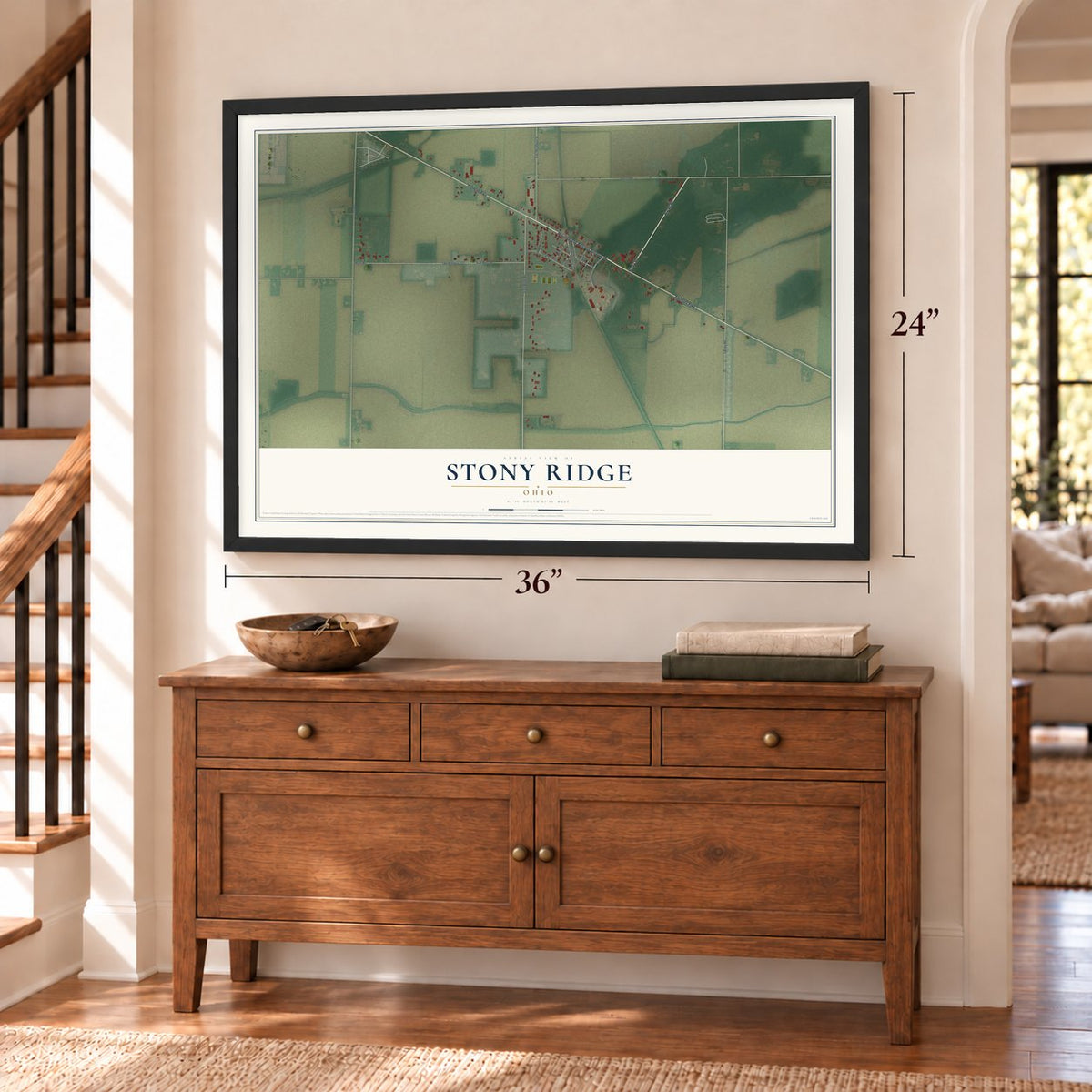 Stony Ridge, Ohio map, 24 x 36 inch print in a black frame above a dresser by a staircase