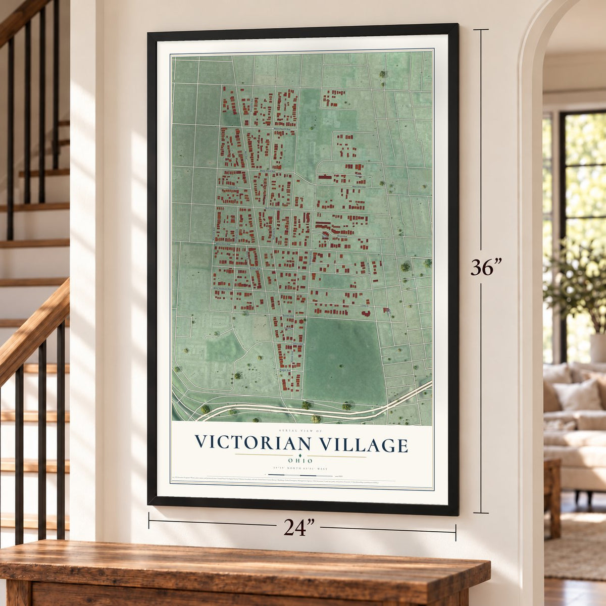 Victorian Village, Ohio map, 24 x 36 inch print in a black frame by a staircase