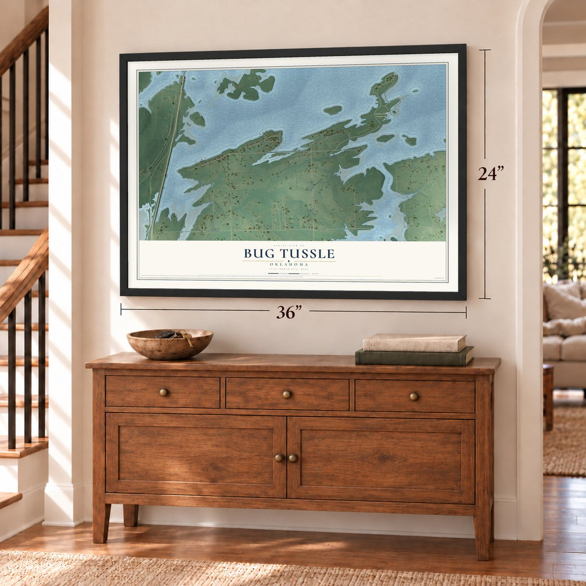 Bug Tussle, Oklahoma map, 24 x 36 inch print in a black frame above a dresser by a staircase