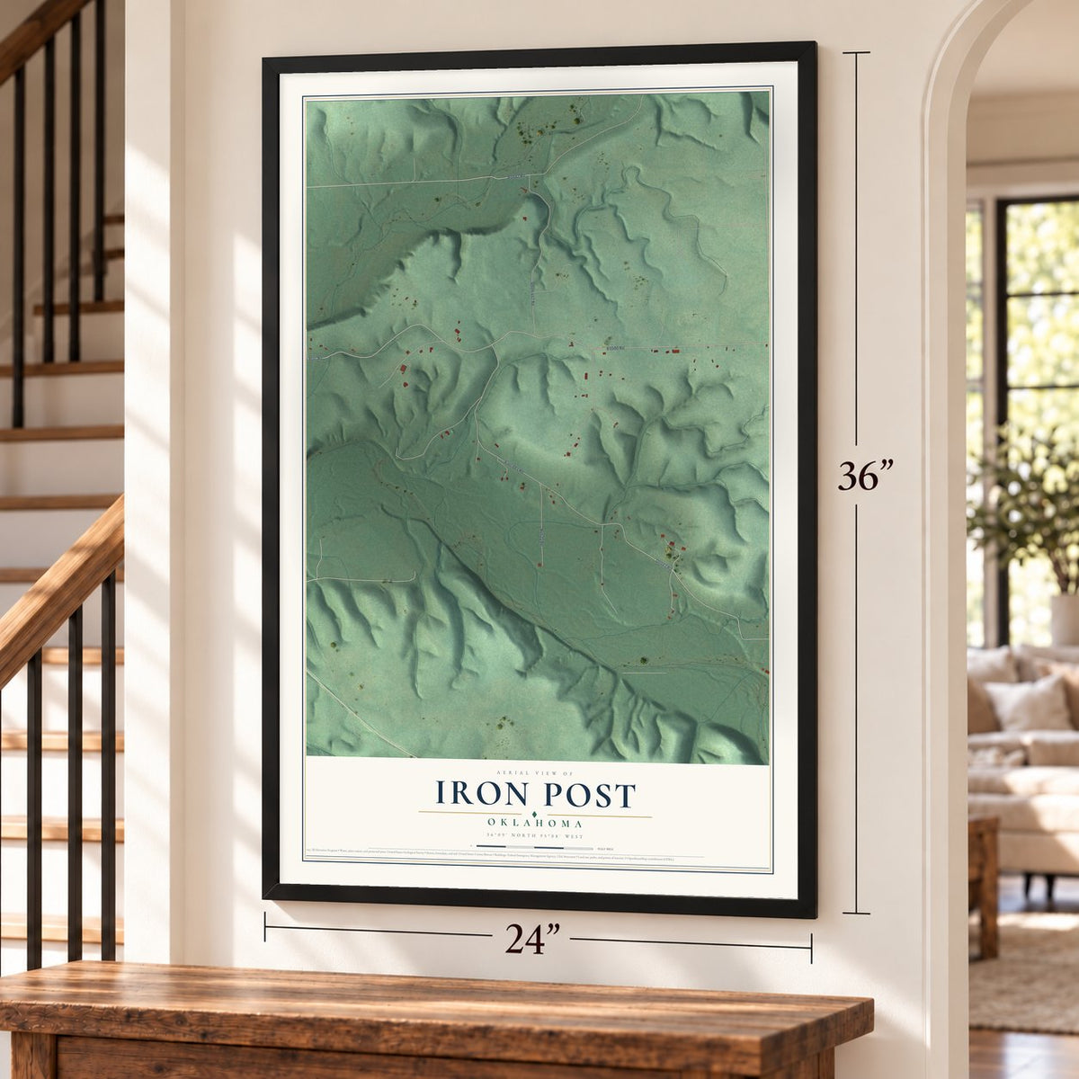 Iron Post, Oklahoma map, 24 x 36 inch print in a black frame by a staircase