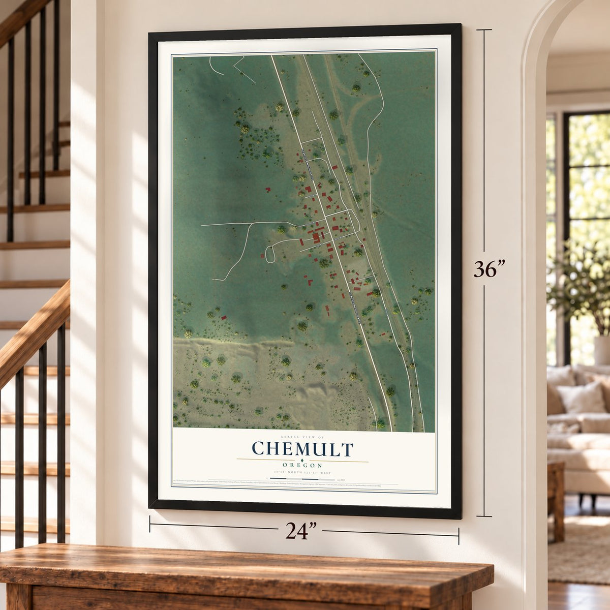 Chemult, Oregon map, 24 x 36 inch print in a black frame by a staircase