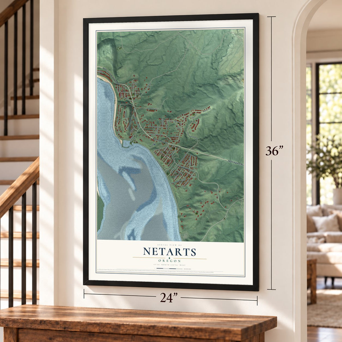 Netarts, Oregon map, 24 x 36 inch print in a black frame by a staircase