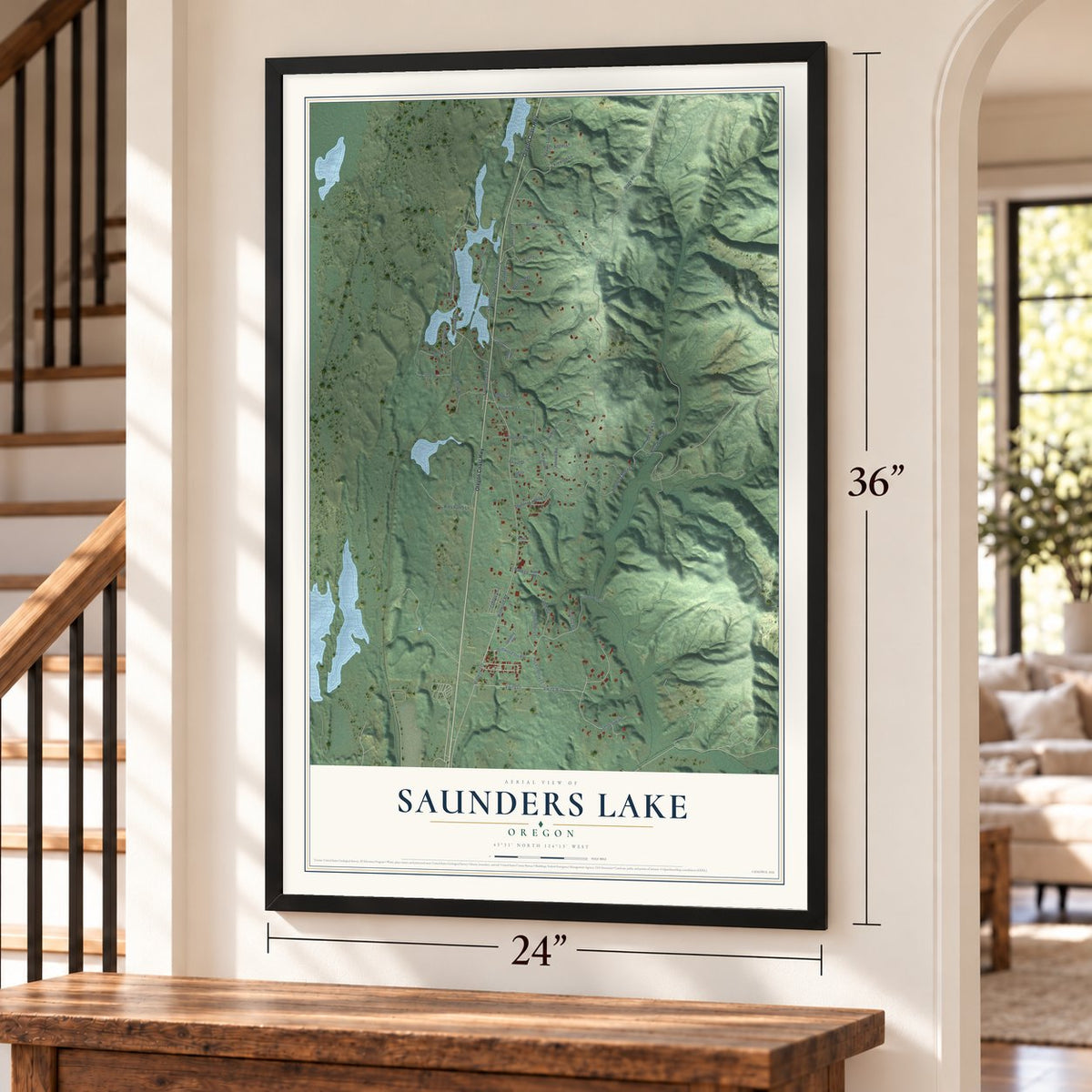 Saunders Lake, Oregon map, 24 x 36 inch print in a black frame by a staircase