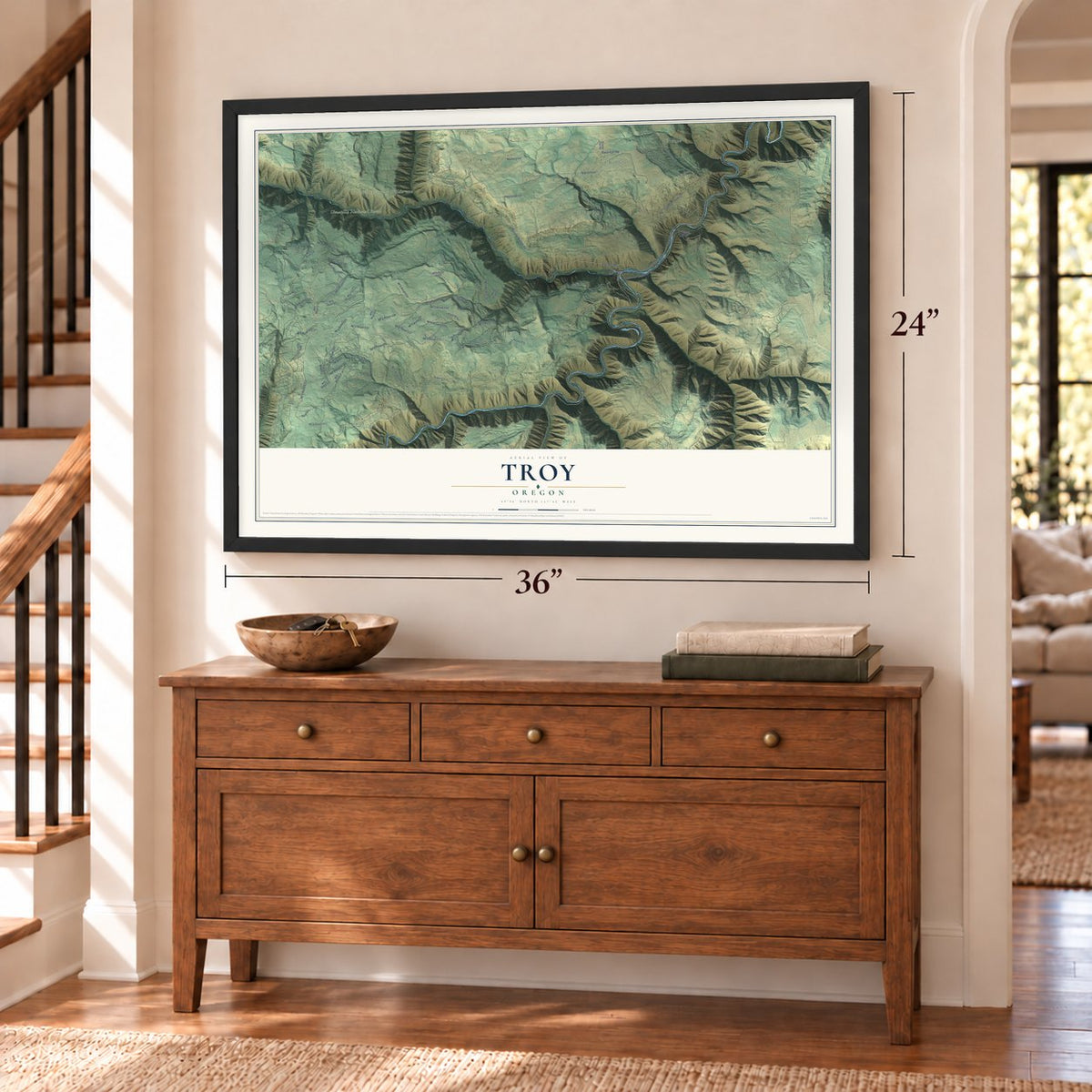 Troy, Oregon map, 24 x 36 inch print in a black frame above a dresser by a staircase