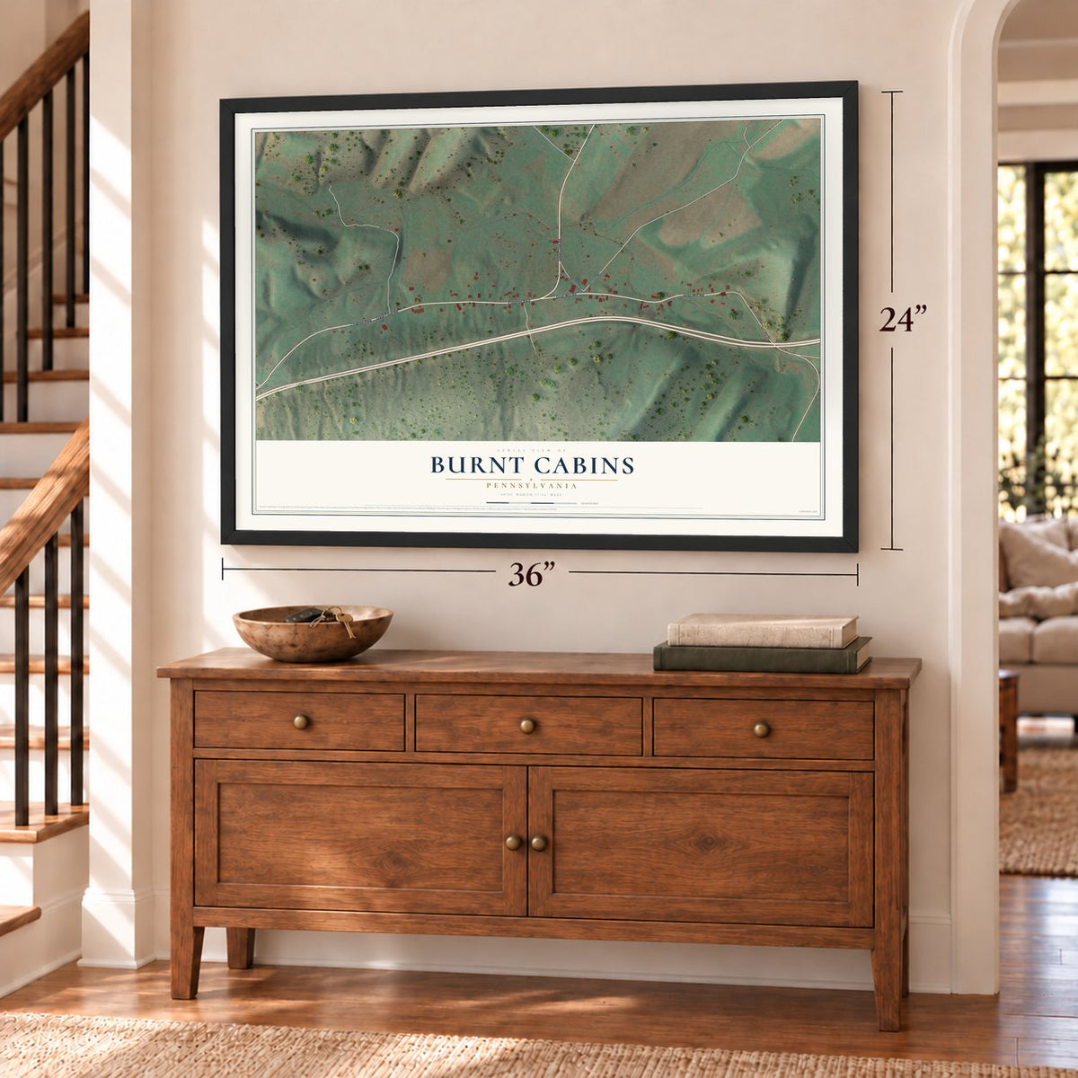 Burnt Cabins, Pennsylvania map, 24 x 36 inch print in a black frame above a dresser by a staircase