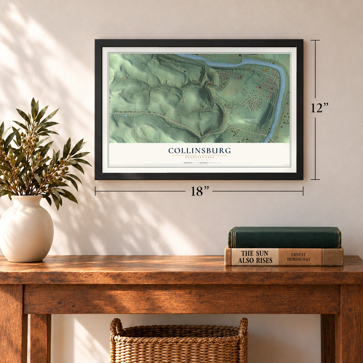 Collinsburg, Pennsylvania map, 12 x 18 inch print in a black frame in an entryway