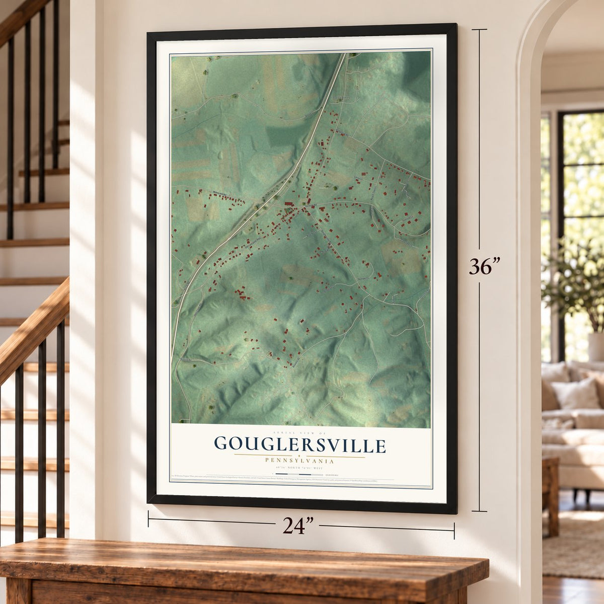 Gouglersville, Pennsylvania map, 24 x 36 inch print in a black frame by a staircase