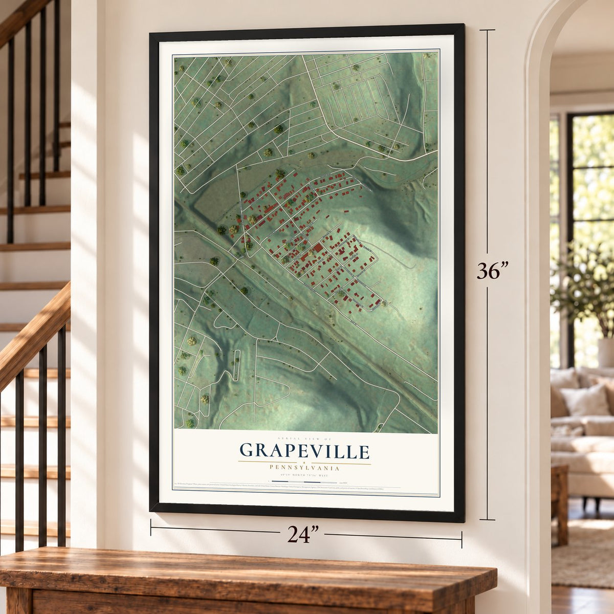 Grapeville, Pennsylvania map, 24 x 36 inch print in a black frame by a staircase