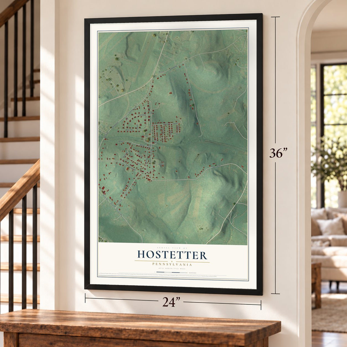 Hostetter, Pennsylvania map, 24 x 36 inch print in a black frame by a staircase