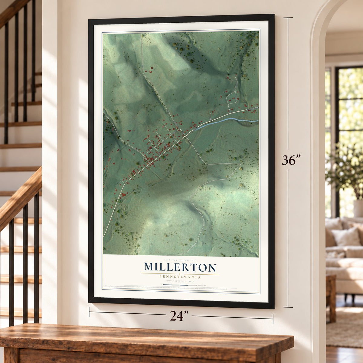 Millerton, Pennsylvania map, 24 x 36 inch print in a black frame by a staircase