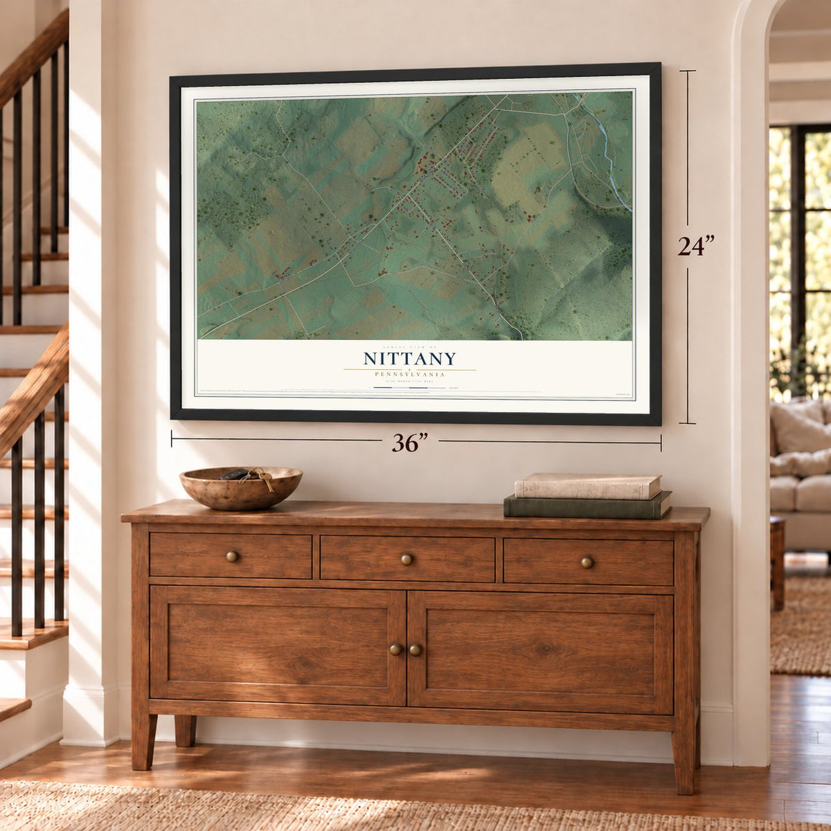 Nittany, Pennsylvania map, 24 x 36 inch print in a black frame above a dresser by a staircase