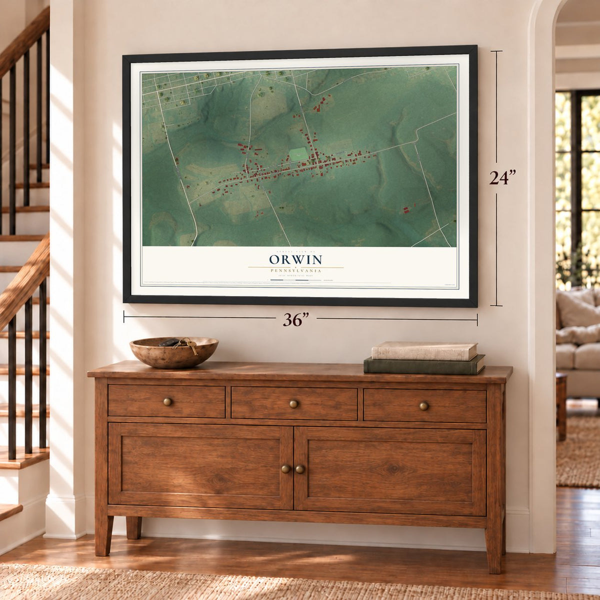 Orwin, Pennsylvania map, 24 x 36 inch print in a black frame above a dresser by a staircase
