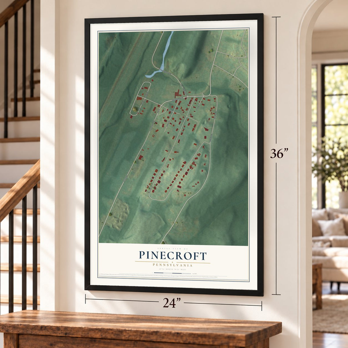 Pinecroft, Pennsylvania map, 24 x 36 inch print in a black frame by a staircase