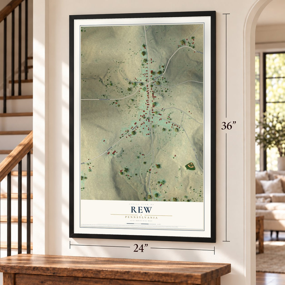 Rew, Pennsylvania map, 24 x 36 inch print in a black frame by a staircase