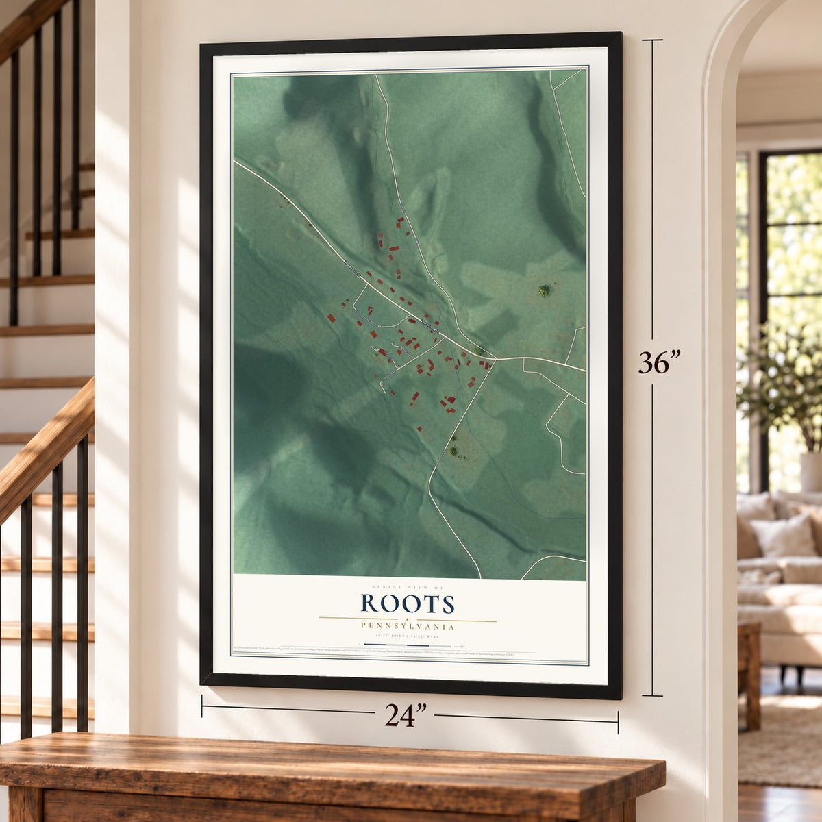 Roots, Pennsylvania map, 24 x 36 inch print in a black frame by a staircase