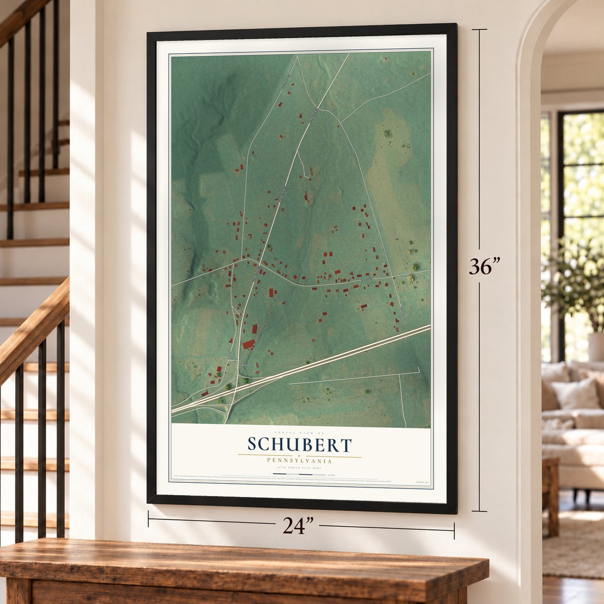 Schubert, Pennsylvania map, 24 x 36 inch print in a black frame by a staircase
