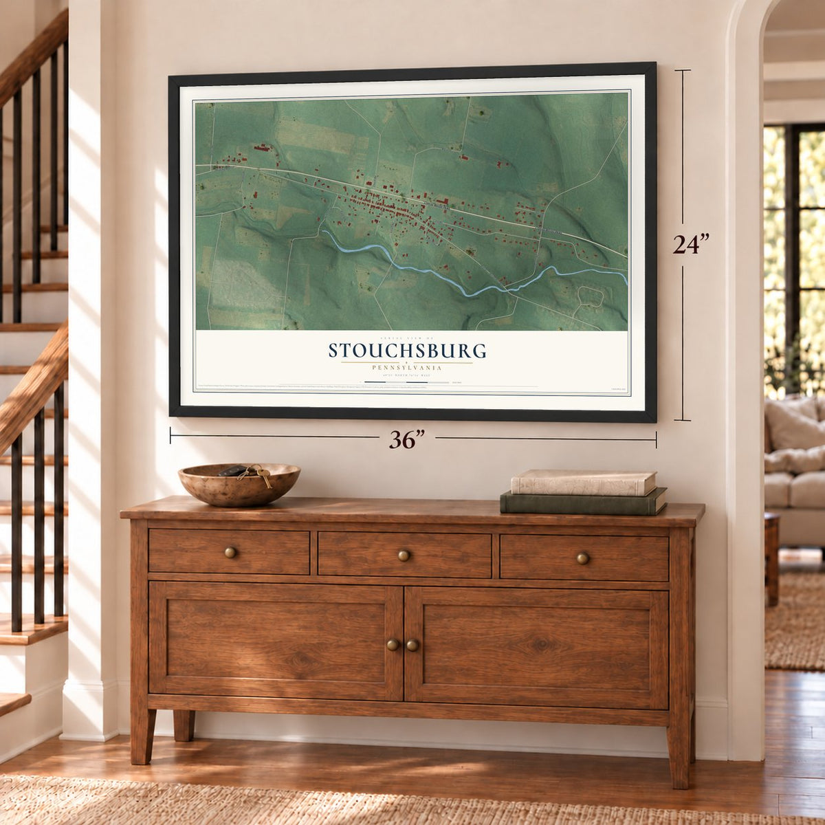 Stouchsburg, Pennsylvania map, 24 x 36 inch print in a black frame above a dresser by a staircase