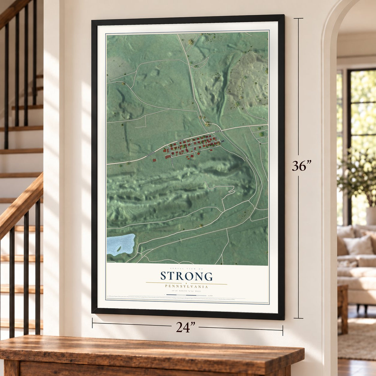 Strong, Pennsylvania map, 24 x 36 inch print in a black frame by a staircase