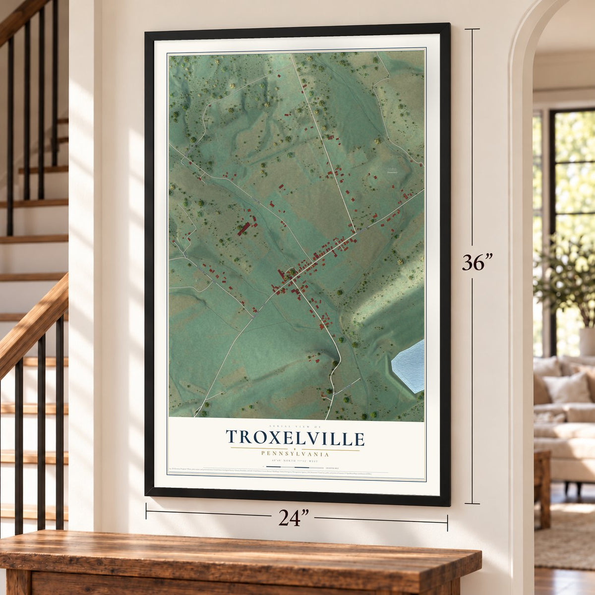Troxelville, Pennsylvania map, 24 x 36 inch print in a black frame by a staircase