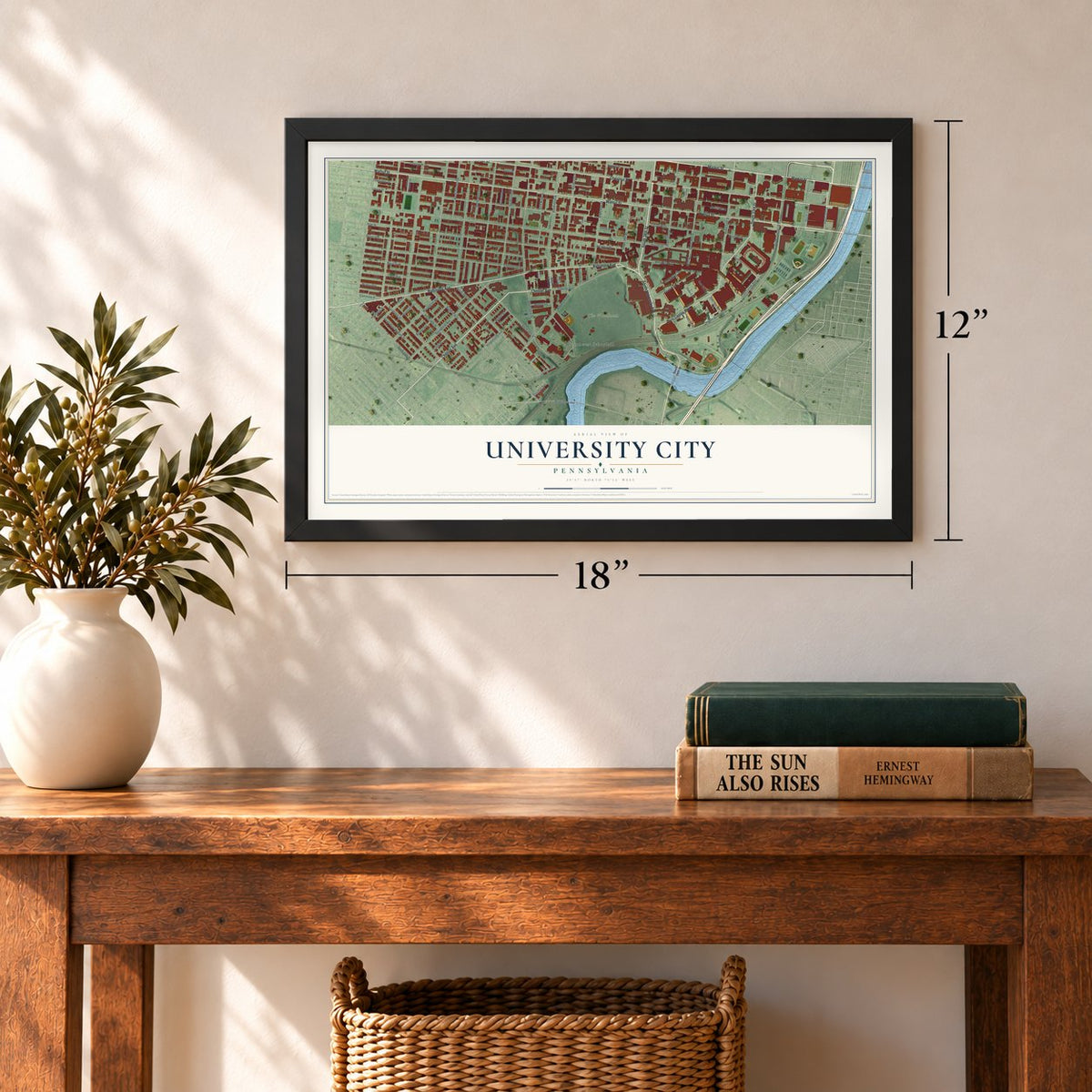 University City, Pennsylvania map, 12 x 18 inch print in a black frame in an entryway