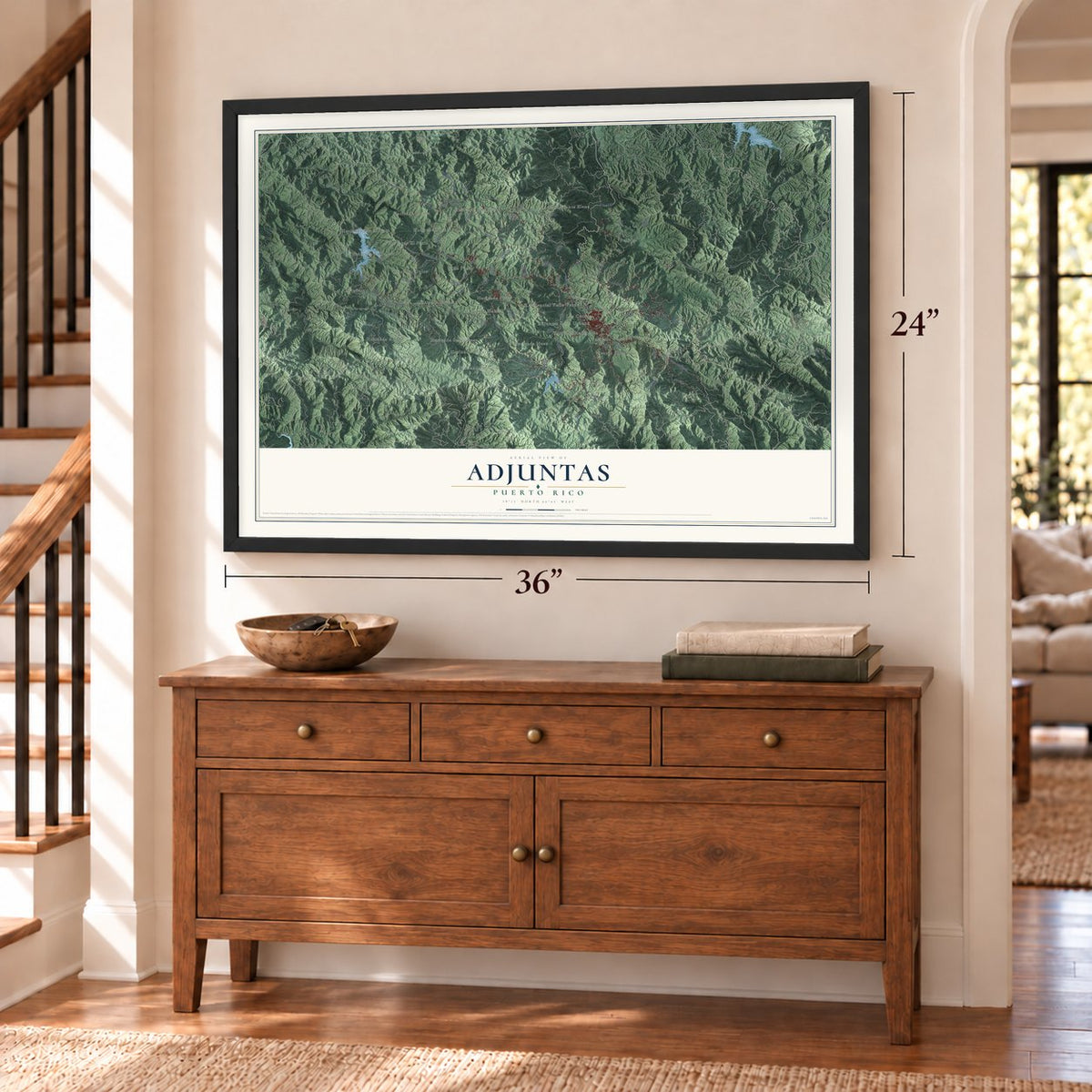 Adjuntas, Puerto Rico map, 24 x 36 inch print in a black frame above a dresser by a staircase