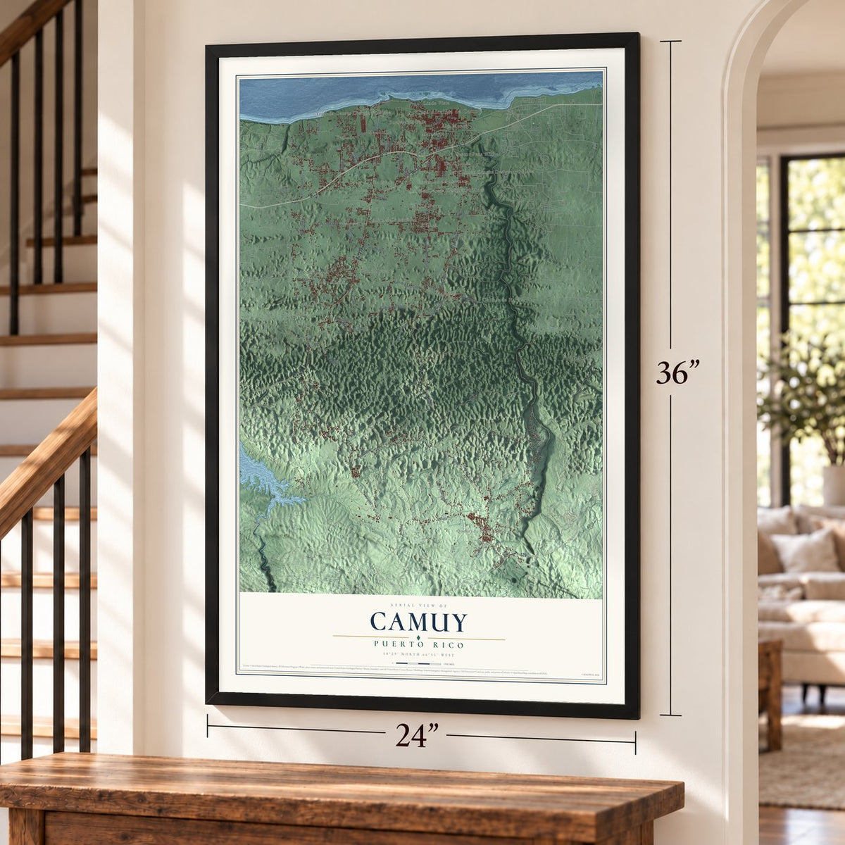 Camuy, Puerto Rico map, 24 x 36 inch print in a black frame by a staircase