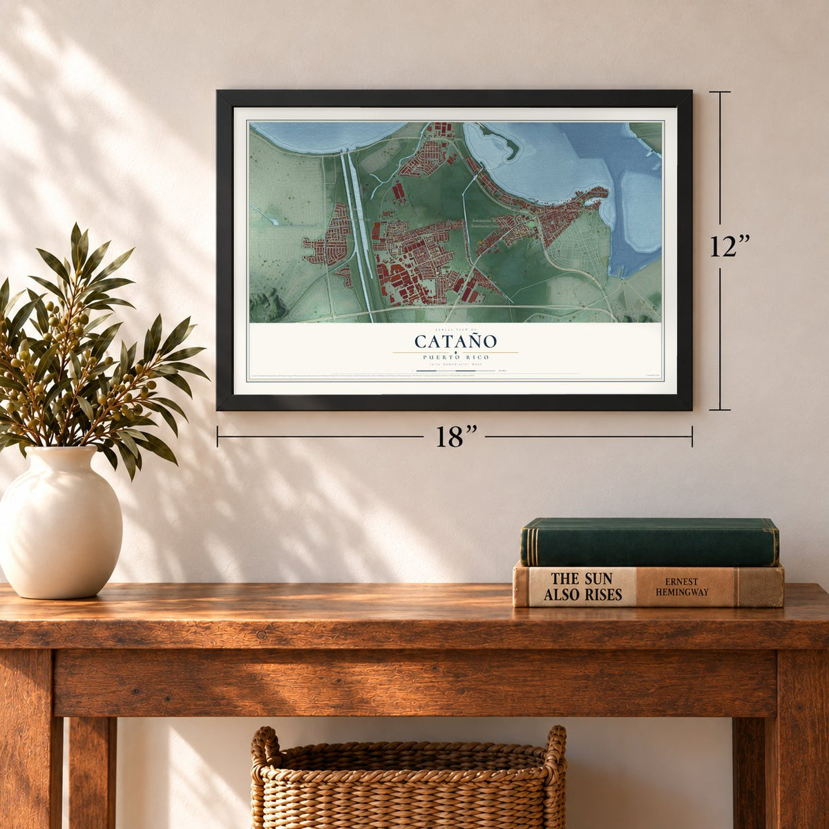 Cataño, Puerto Rico map, 12 x 18 inch print in a black frame in an entryway