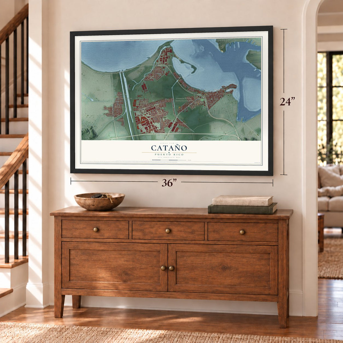 Cataño, Puerto Rico map, 24 x 36 inch print in a black frame above a dresser by a staircase