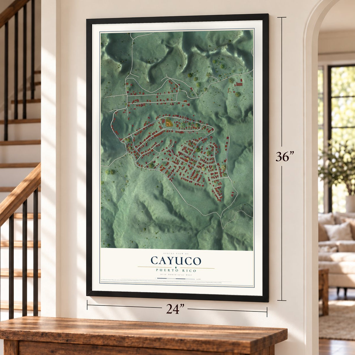 Cayuco, Puerto Rico map, 24 x 36 inch print in a black frame by a staircase