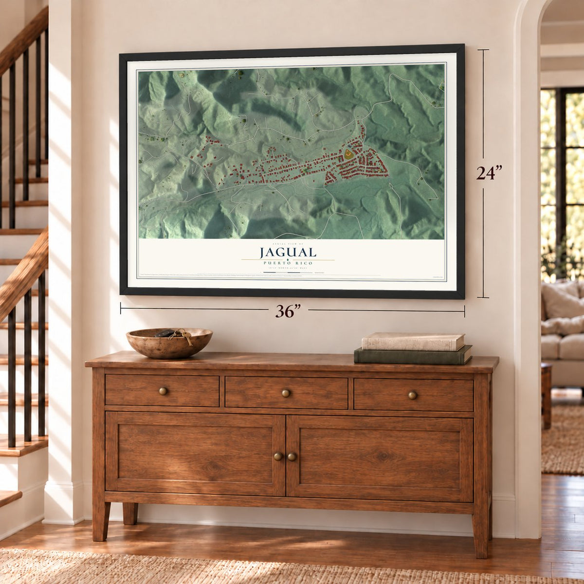Jagual, Puerto Rico map, 24 x 36 inch print in a black frame above a dresser by a staircase