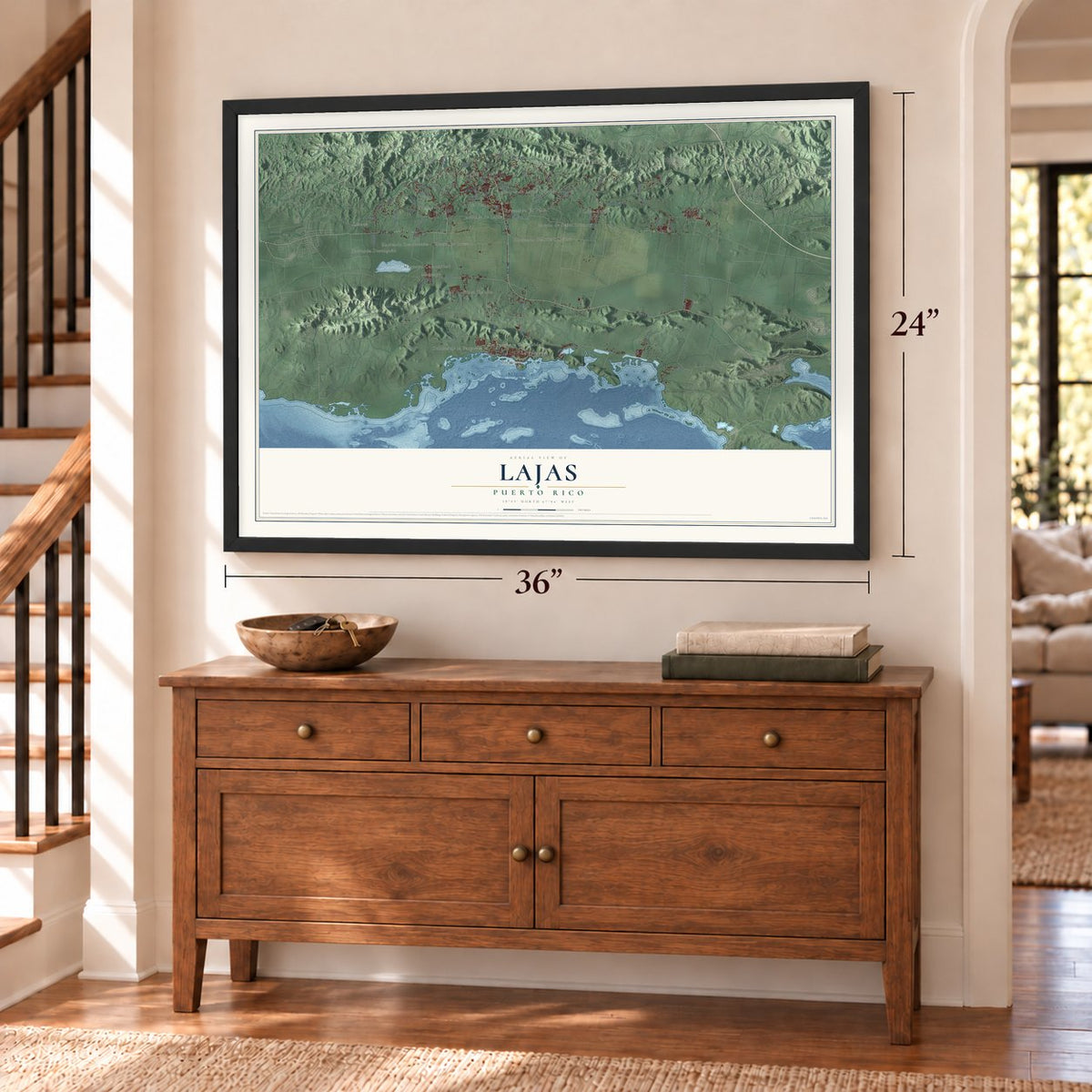 Lajas, Puerto Rico map, 24 x 36 inch print in a black frame above a dresser by a staircase