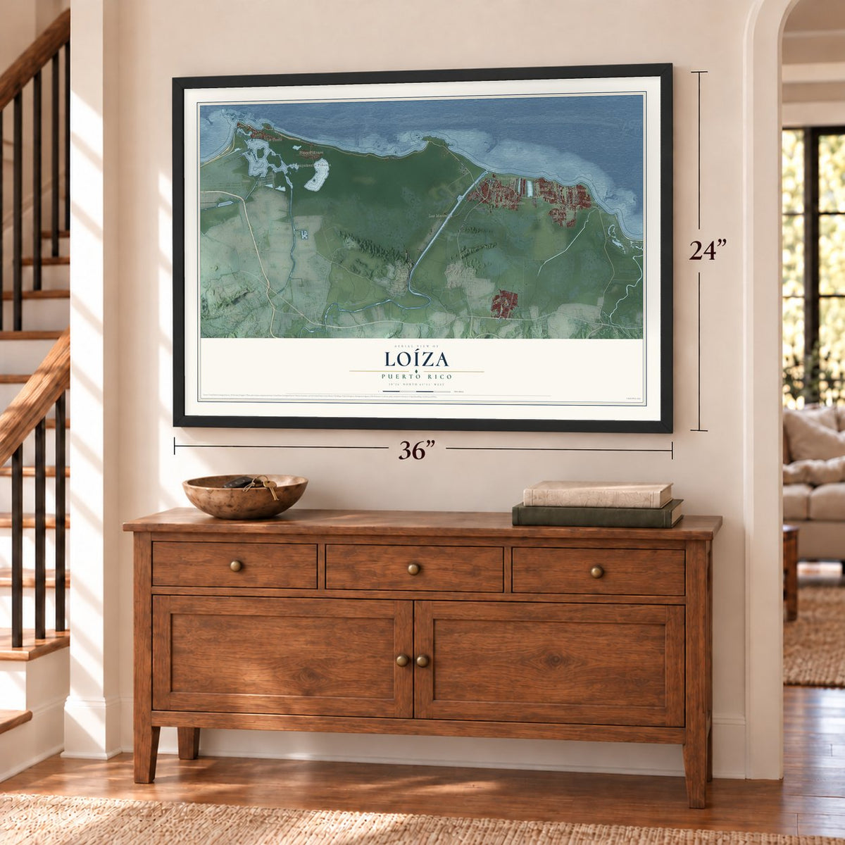 Loíza, Puerto Rico map, 24 x 36 inch print in a black frame above a dresser by a staircase