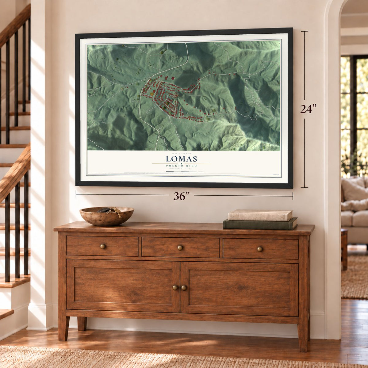 Lomas, Puerto Rico map, 24 x 36 inch print in a black frame above a dresser by a staircase