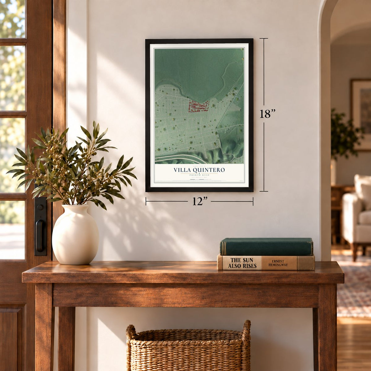 Villa Quintero, Puerto Rico map, 12 x 18 inch print in a black frame in an entryway