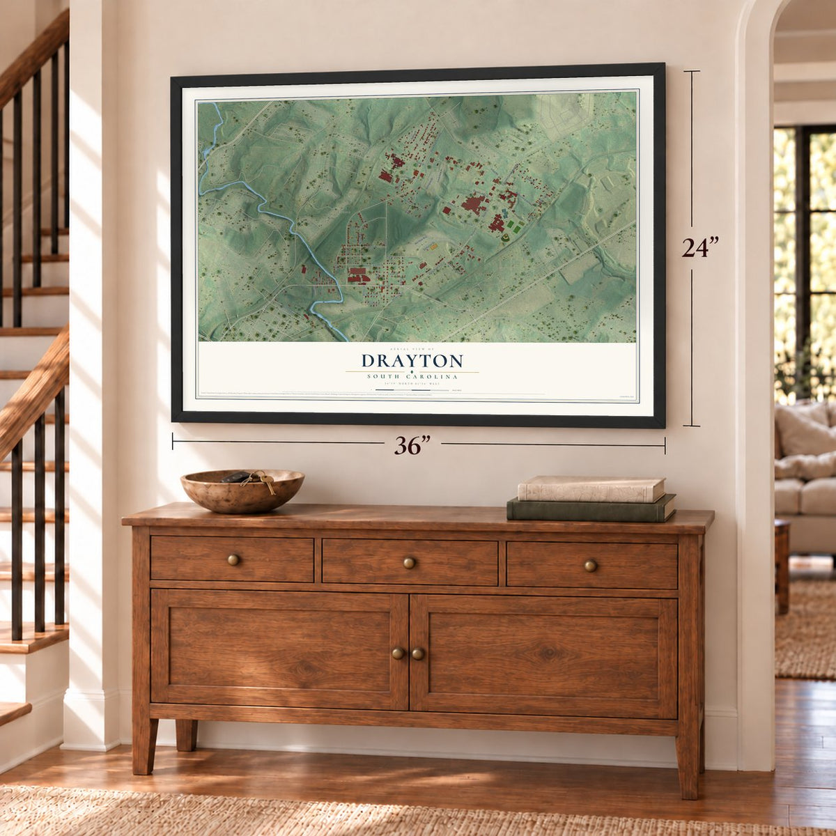 Drayton, South Carolina map, 24 x 36 inch print in a black frame above a dresser by a staircase